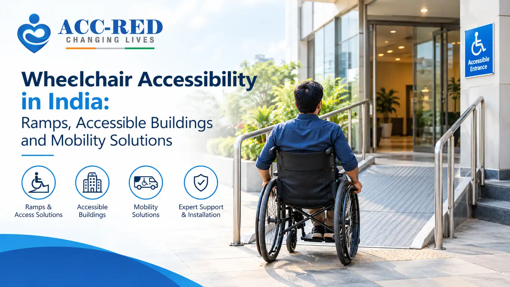 Wheelchair user accessing a modern building entrance using an accessible ramp with handrails