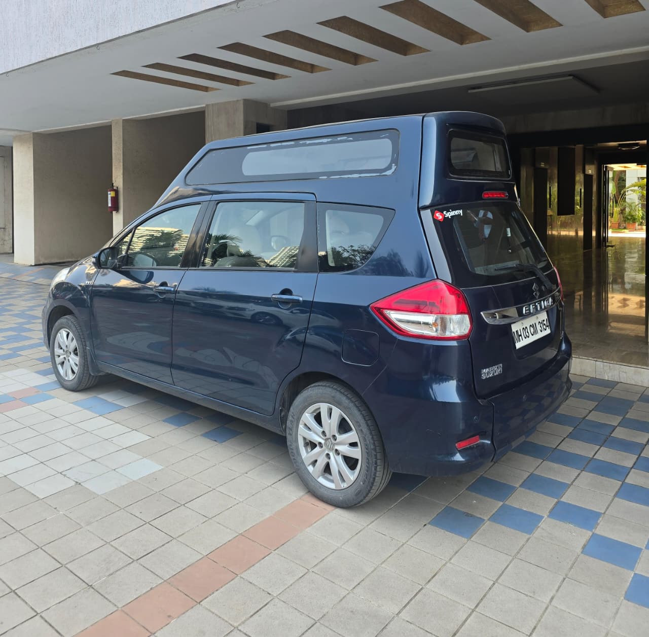 Wheelchair lift deployed from an accessible Asha School vehicle